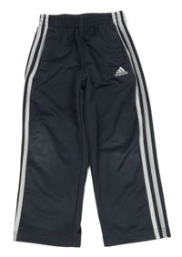 Šedé sportovní tepláky s pruhy a logem Adidas