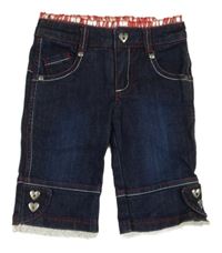 Tmavomodré capri rifle s volánikmi Mayoral