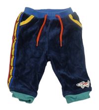 Tmavomodré sametové kalhoty s proužky 