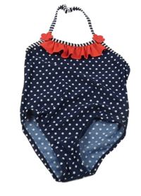 Tmavomodré jednodílné plavky s bílými hvězdičkami a volánkem 