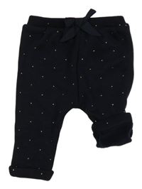 Tmavomodré puntíkaté zateplené tepláky Kiabi