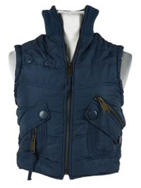 Dámská tmavomodrá šusťáková zateplená crop vesta 