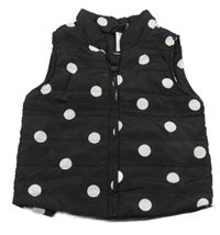 Černo-bílá puntíkatá šusťáková lehce zateplená vesta 