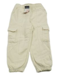 Nové - Smetanové tepláky s kapsami Primark