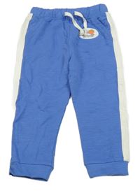 Modré tepláky s nášivkou a bielým pruhom M&S