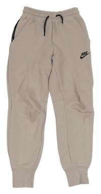 Pudrové tepláky s logem Nike