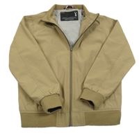 Písková šusťáková jarní bunda Next