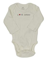 Smetanové body s nápisem H&M