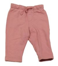 Růžové tepláky lupilu