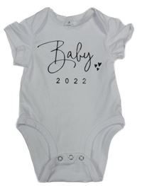 Biele body s nápisom