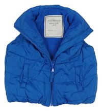 Modrá prešívaná šušťáková zateplená vesta Mothercare