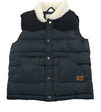 Tmavomodrá šusťáková zateplená vesta s beránkem Matalan