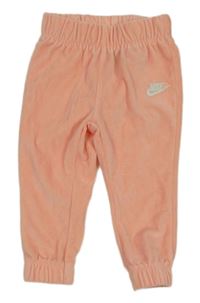 Růžové plyšové tepláky s logem Nike