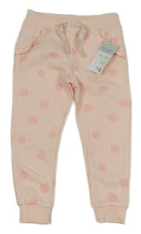 Nové - Růžové puntíkaté tepláky s volánky Primark