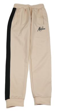 Růžové sportovní tepláky s pruhem a nápisem