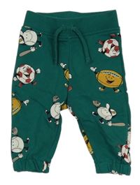 Zelené tepláky s loptami Primark