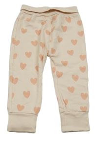 Světlerůžové tepláky se srdíčky Mothercare