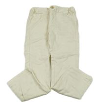 Smotanové skinny nohavice s bodkami KIABI