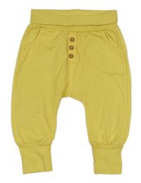 Žlté tepláky s gombíkmi