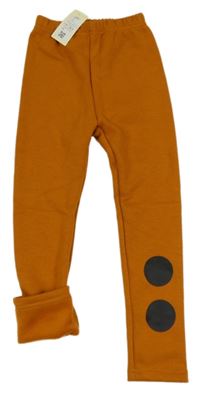 Nové - Oranžové zateplené legíny s bodkami