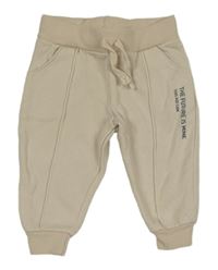 Béžové tepláky s nápisom Primark