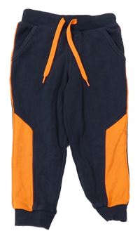 Tmavomodro-neonově oranžové tepláky Topolino