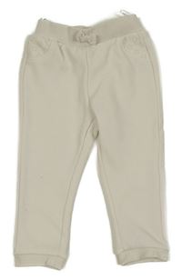 Smotanové tepláky s mašlou C&A