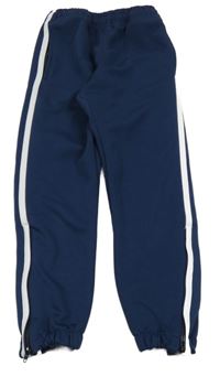 Tmavomodré sportovní tepláky s bílými pruhy 