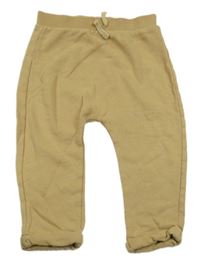 Béžové tepláky TU