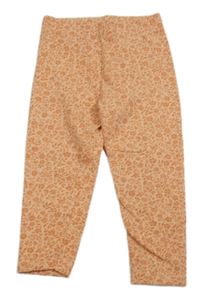 Oranžové kvetované legíny Nutmeg