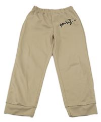 Béžové tepláky s nápisem Shein