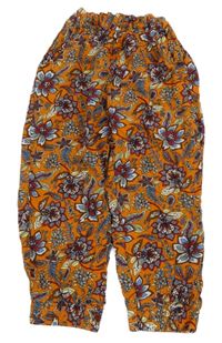 Oranžovo-farebné kvetované ľahké nohavice