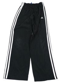 Černé šusťákové kalhoty s pruhy Adidas