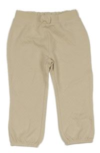 Béžové vzorované tepláky C&A