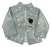 Šedé flitrové slavnostní sako s brožemi