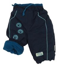Tmavomodré šušťákové zateplené nohavice s tlapkami