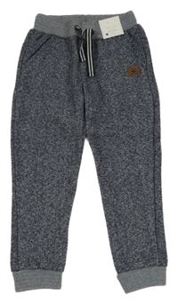 Nové - Modro-bílé melírované tepláky s nášivkou F&F