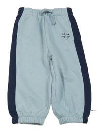 Modro-tmavomodré teplákové tepláky so skateboardem/smajlíkem St. Bernard