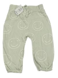 Nové - Světlezelené tepláky se smajlíky George