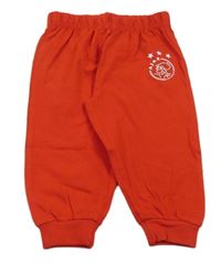 Červené ľahké tepláky s nápisom