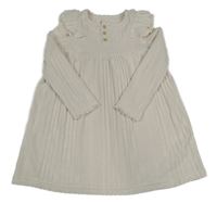 Smotanové svetrové šaty s volány