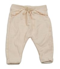 Broskvové tepláky s volánikmi Tape Á L´oeil