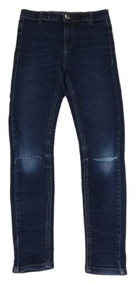 Tmavomodré rifle s dírami na kolenkou C&A