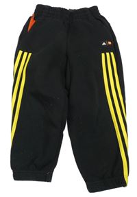 Čierne tepláky s pruhmi Adidas