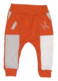 Korálovo-biele tepláky s nápismi