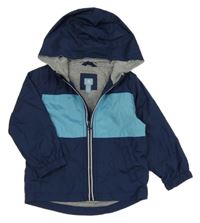 Tmavomodrá šusťáková jarní bunda s modrým pruhem a kapucí GAP