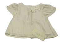 Bílá třpytivá halenka s mašlí Mothercare