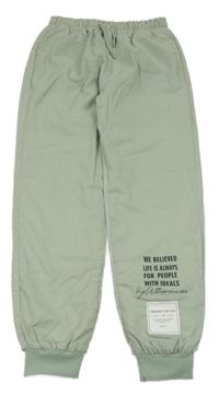 Světlezelené šusťákové zateplené cuff kalhoty s nápisy