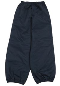 Tmavomodré šušťákové nepromokavé nohavice TCM