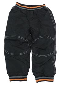 Čierne cuff šušťákové podšité nohavice s pruhmi